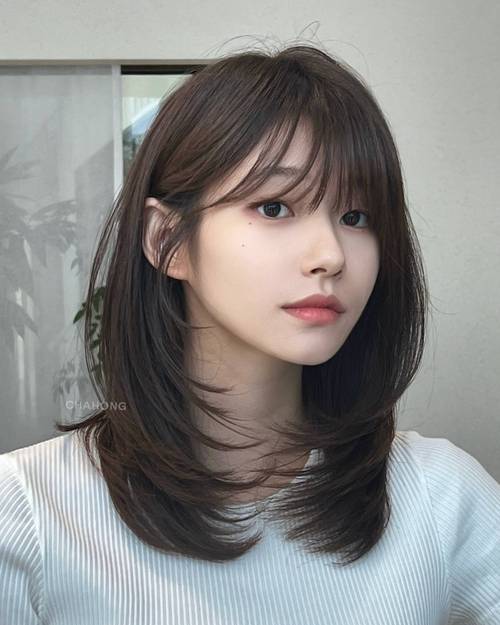 细长脸女生适合的发型_偏分大卷刘海修饰细长脸