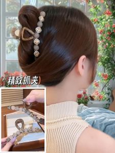 大抓夹怎么夹头发好看_抓夹造型蓬松技巧，发型重心变化及抓夹选择