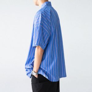 深蓝衣服适合多大年龄_百搭深蓝，优雅气质，时尚之选