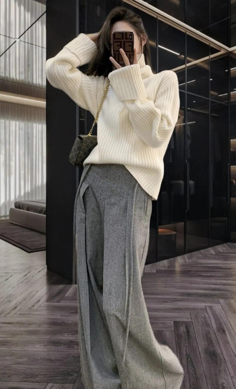 大款毛衣怎么搭配裤子_毛衣搭过膝靴显高显瘦，搭裤裙外套各有特色